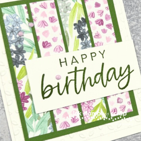 four-paper-scraps-happy-birthday-angle close up of flower scraps with dots and popped up greeting layer