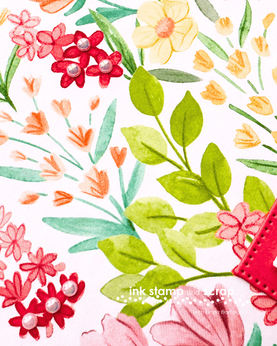 add iridescent pearls to flowers in the patterned paper